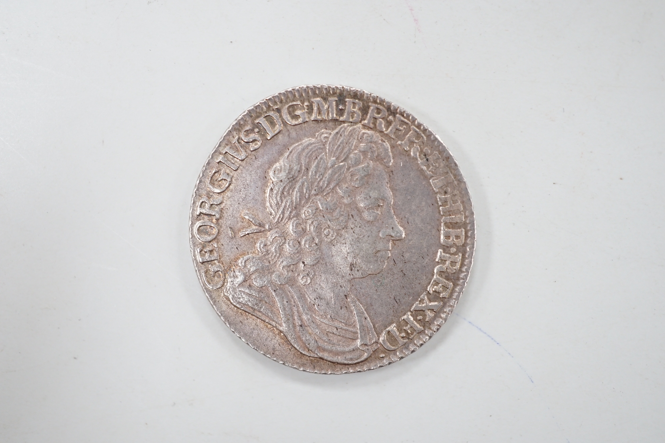 A George I shilling 1723 SSC, 1st bust, GEF